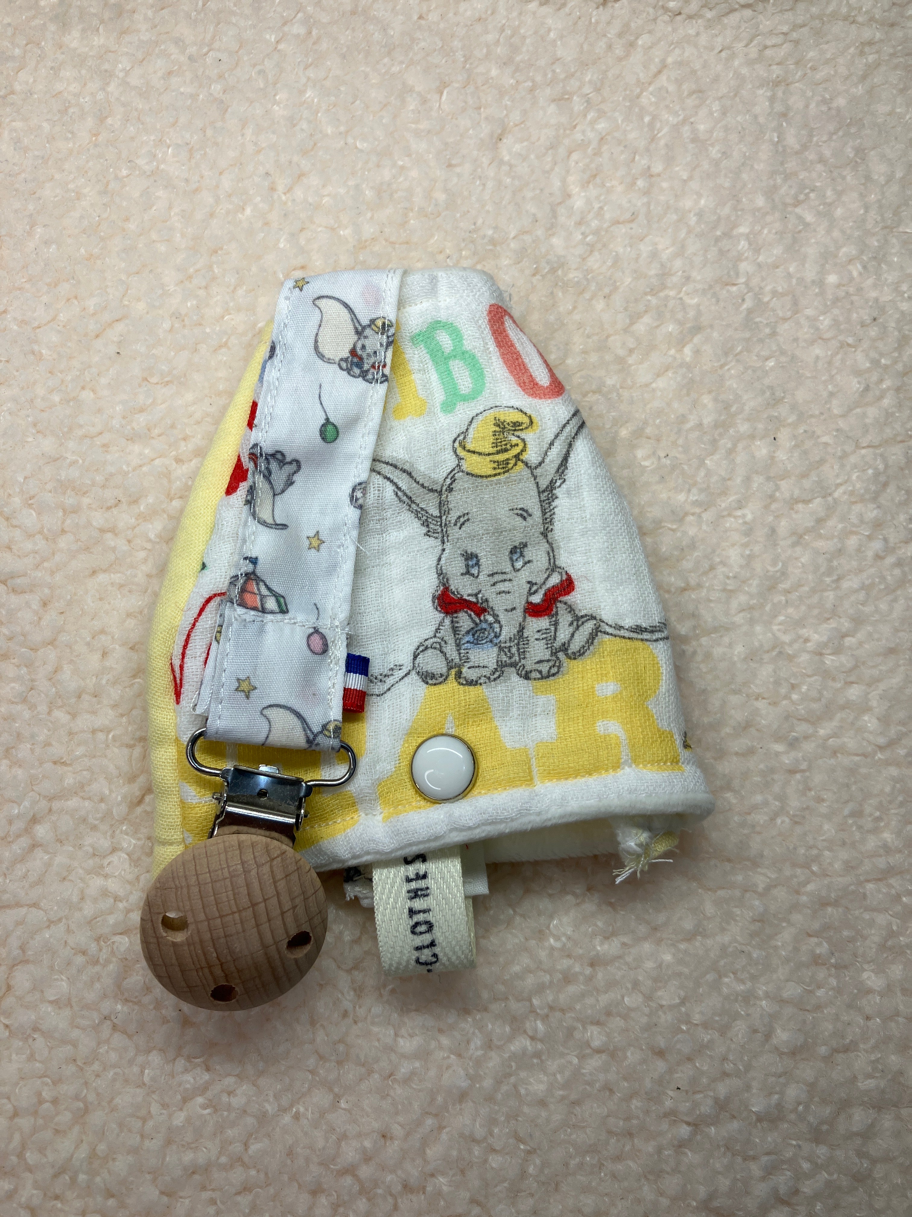 Ensemble cloche + attache tétine Dumbo assortis